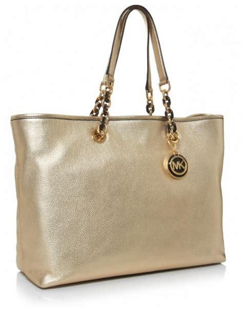 michael kors gold purse tassle